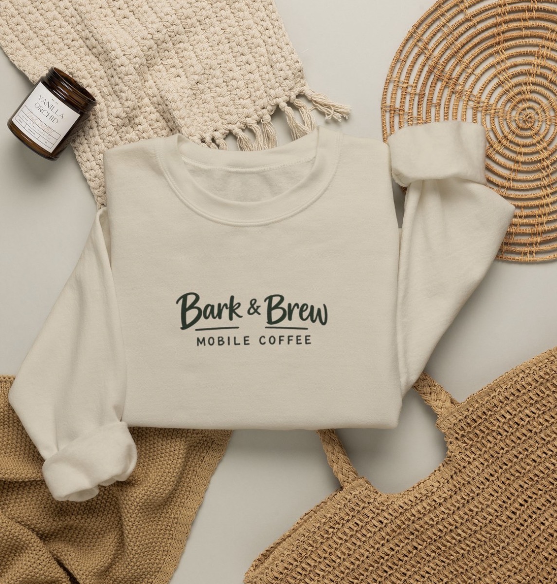 Cream sweatshirt with the Bark & Brew Mobile Coffee logo on the chest — the front of the “Sundays are for the good boys” sweatshirt